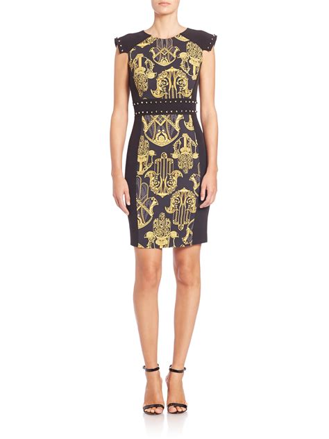 black latex versace dress|Versace black and gold dress.